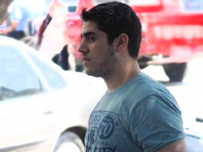 نجل الرئيس مرسي يعتدي على ضاط شرطة ويمزق ملابسه وضباط الشرطة يتظاهرون 1 01 03 13 685224924