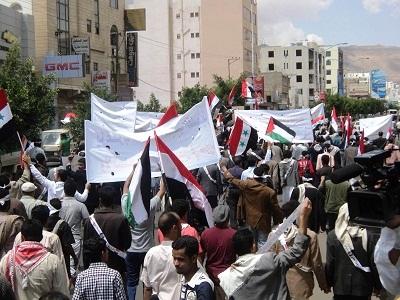 البعث ينظم مسيرة في صنعاء نددت بقمة الدوحة ورفعت الاعلام السورية وصور بشار الأسد 1 28 03 13 745866452